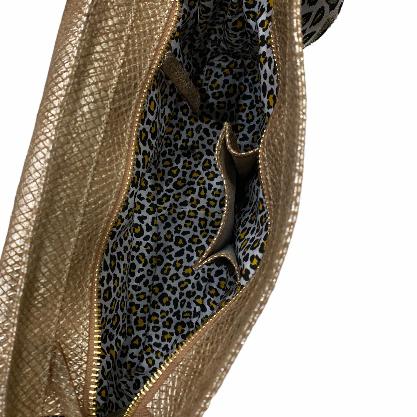 MANDY. GOLD STATEMENT LEATHER BAG