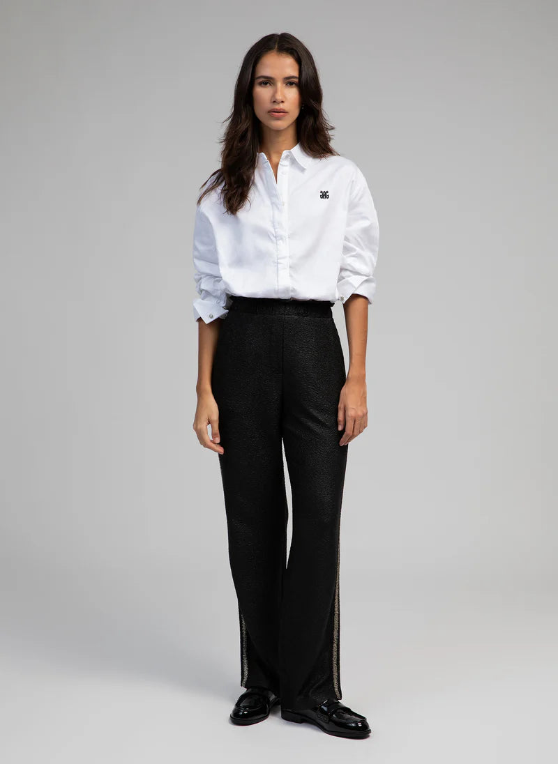 BLACK PANTS WITH SILVER DETAILS