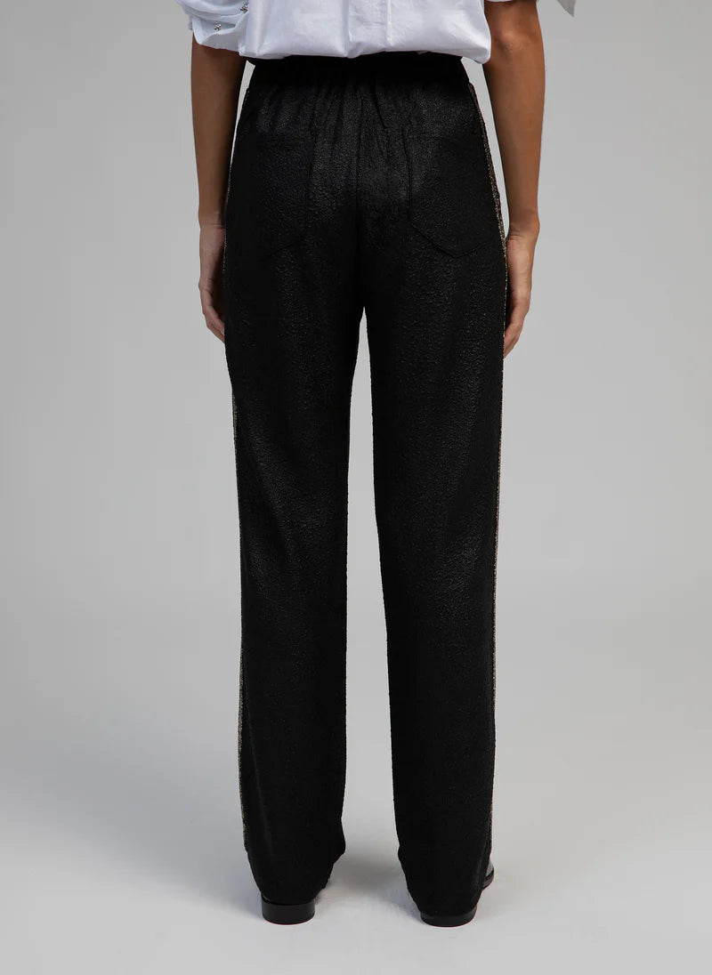 BLACK PANTS WITH SILVER DETAILS