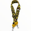 Yellow leopard-print adjustable strap with leather details