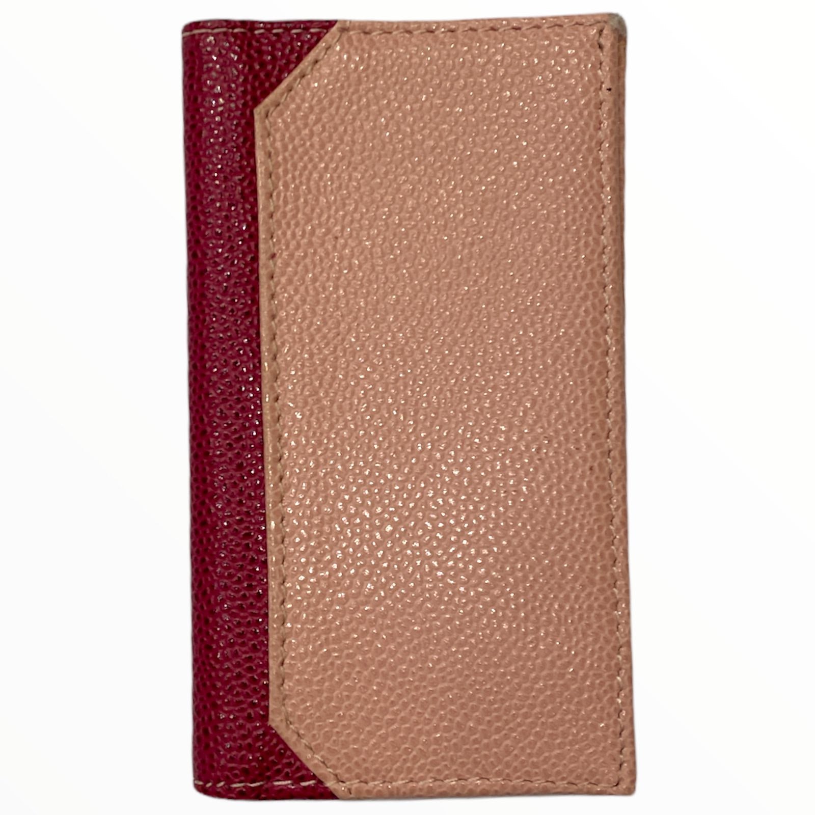 Pink leather card holder with fuchsia details