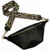 Black alligator-print leather belt bag with beige strap