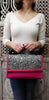 Luxury fuschia textile glitter bag with velvet details