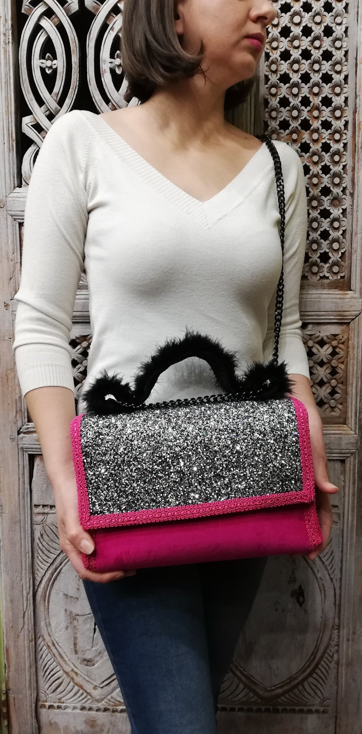 Luxury fuschia textile glitter bag with velvet details