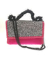 Luxury fuschia textile glitter bag with velvet details