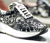 Worn by Olivia Palermo.Black sneakers with lace