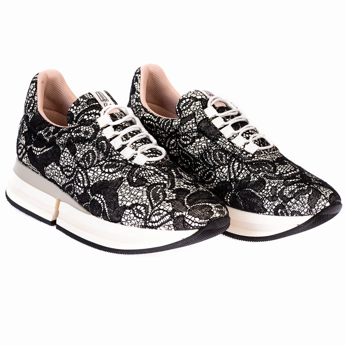 Worn by Olivia Palermo.Black sneakers with lace