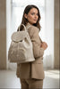TRAVELLING. BEIGE LEATHER BACKPACK WITH 3D DETAILS