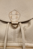 TRAVELLING. BEIGE LEATHER BACKPACK WITH 3D DETAILS