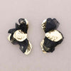 HALF FLOWER STATEMENT EARRINGS