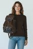 TRAVELLING. DARK CHOCO LEATHER BACKPACK WITH ART DETAILS