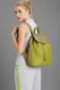 TRAVELLING. LIME LEATHER BACKPACK WITH GOLD DETAILS