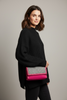 Luxury fuschia textile glitter bag with velvet details
