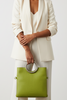 CIRCLE FLAT. LIME LEATHER ART MESSENGER BAG