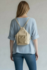 Niovi small. Vanilla and gold leather backpack