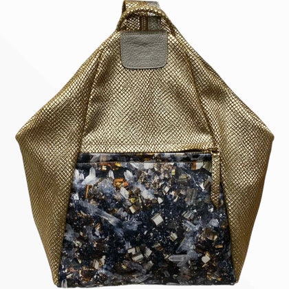 Niovi. Gold art leather backpack