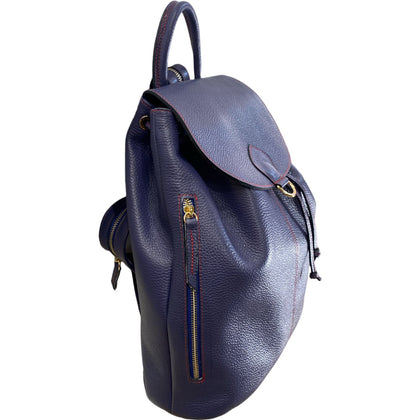 Travelling. Navy blue leather backpack
