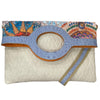 Circle flat. Art sun and off-white leather messenger bag