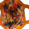 Circle flat. Art stones and yellow leather messenger bag