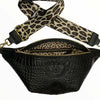 Black alligator-print leather belt bag with beige strap