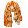 Orange scarf with gold art polka dots