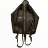 Niovi. Brown leather backpack with woven details