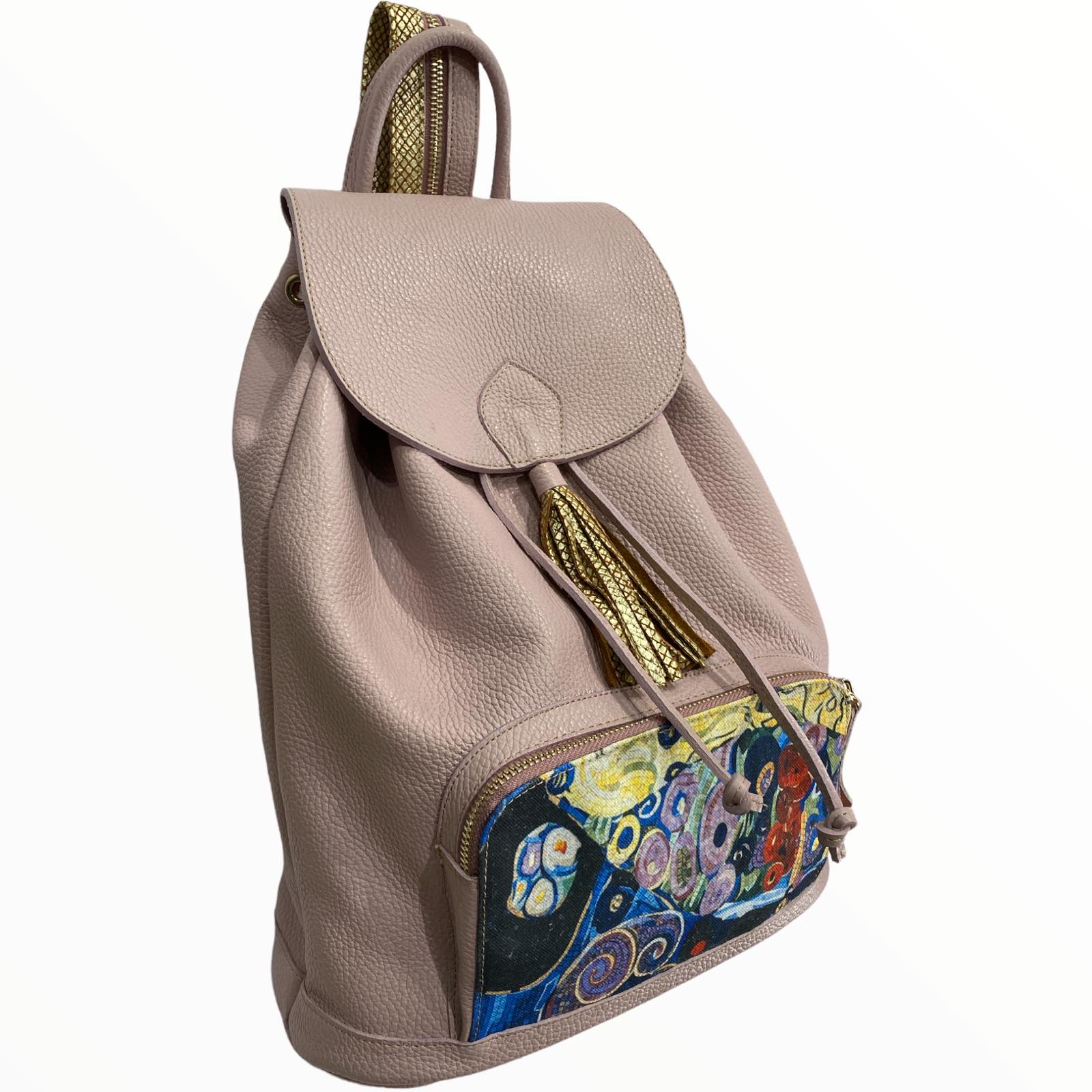 Travelling. Lavender leather backpack with art details