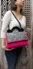 Luxury fuschia textile glitter bag with velvet details