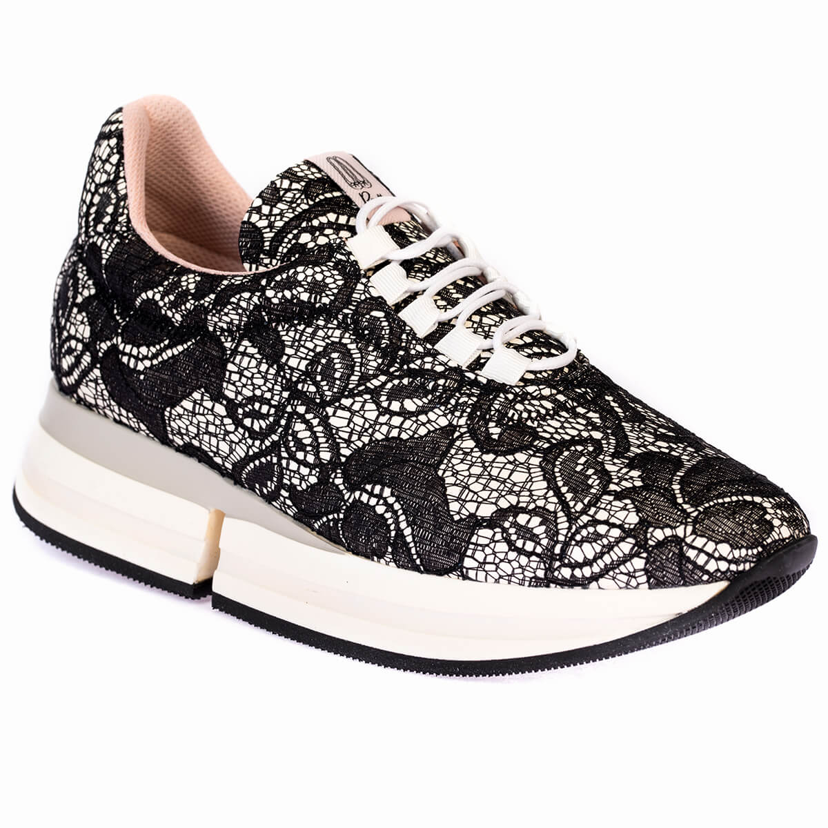 Worn by Olivia Palermo.Black sneakers with lace